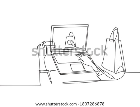 One continuous line drawing young beauty woman holding credit card to do buying transaction at online shop using laptop. Shopping in online store concept. Single line draw design illustration