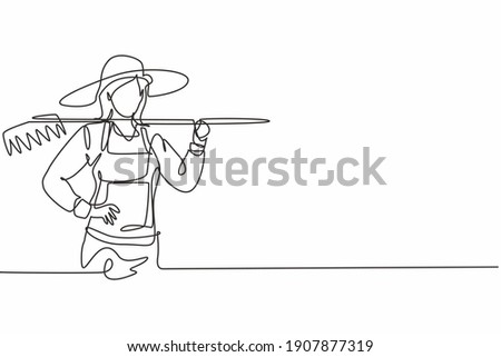 Single one line drawing young female farmer holding fork posing with hands on hip. Professional work profession and occupation minimal concept. Continuous line draw design graphic vector illustration