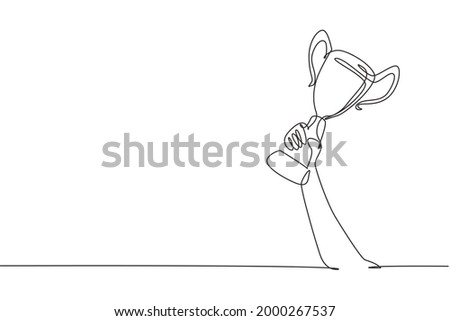 Single continuous line drawing 
gold trophy held by one hand. Symbol of winning championships, matches and sports competitions. Best achievement ever. One line draw graphic design vector illustration