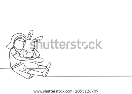 Continuous one line drawing little girl hug her doll and cry or scared or sad or feel bad or in trouble. Sitting on floor. Concept of orphan kid. Single line draw design vector graphic illustration 商業照片 © 