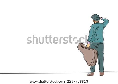 Image, Stock Photo Musician holding guitar at seaside