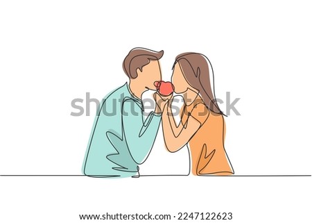 Single one line drawing young beautiful couple sharing apple. Celebrate wedding anniversaries and enjoy romantic lunch at restaurant. Modern continuous line draw design graphic vector illustration