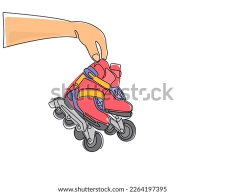Single one line drawing player hand holds rollerblade. Man hand holding pair of old retro plastic inline skates shoes. Vintage classic extreme sport. Continuous line draw design vector illustration