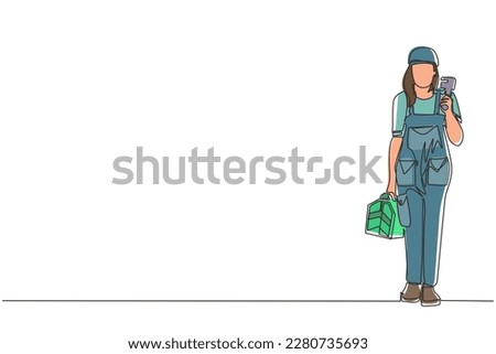 Single one line drawing woman plumber holding wrench and tools box in hands stands isolated. Professional servicewoman character in uniform ready for work. Continuous line draw design graphic vector