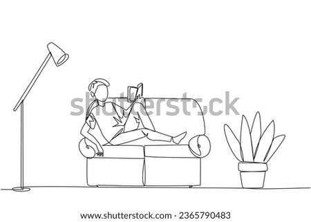 Single continuous line drawing man sitting stretched out on the sofa reading book. Really like the content of the book reading on each page. Impressive. Love read. One line design vector illustration