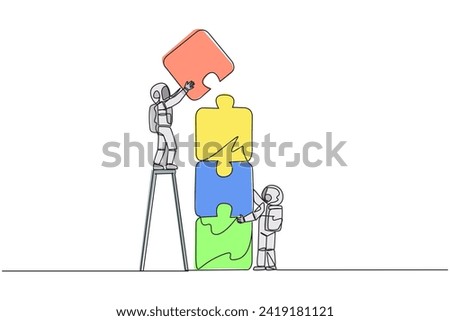 Continuous one line drawing two astronauts putting together a puzzle. One of the two climbs up the ladder to stack the puzzle by four. Great space teamwork. Single line draw design vector illustration