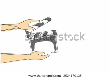 Single one line drawing the hand is holding an open clapper. Filmmaking process. Useful tool for film editors. Synchronization. National Screenwriters Day. Continuous line design graphic illustration