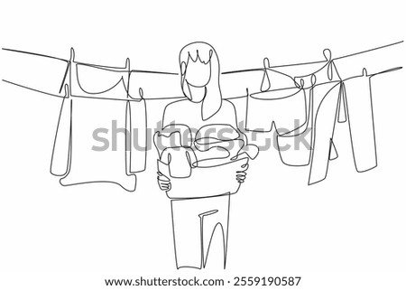 Single continuous line drawing a woman holding a basket filled with piles of clothes. Lift clothes that are dry and clean. Housework. National Hanging Out Day. One line design vector illustration