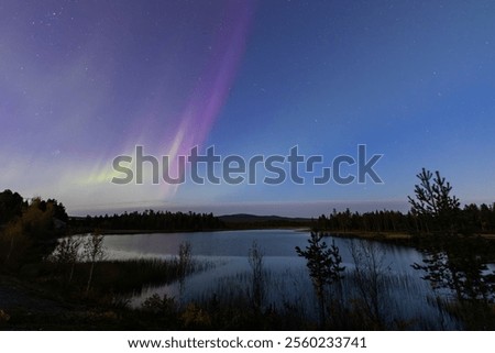 Similar – Foto Bild Szenische Nordlichter bei Nacht in bergigem Terrain