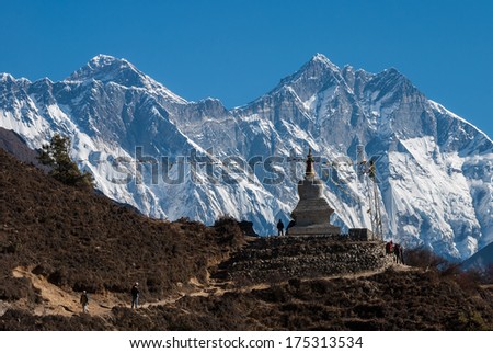 Buddhist stupa with Lhotse wall and Mt. Everest in background, Nepal