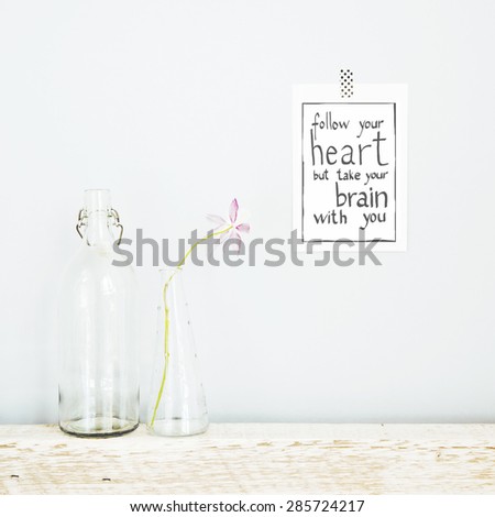 Hipster scandinavian design with pink flower and poster. FOLLOW YOUR HEART
