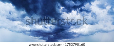 Stormy cloudy sky panorama, dramatic dark blue thunderclouds, gale clouds, thunderstorm landscape wide format, overcast weather, hurricane cloudiness skies, tornado, cloudscape, panoramic heaven view ストックフォト © 