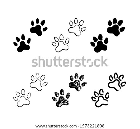Cat paw print vector illustration. Hand drawn animal paw hand drawn sketch isolated on white background - outline & filled. Minimalistic cat/dog footprint design elements collection for decorations.