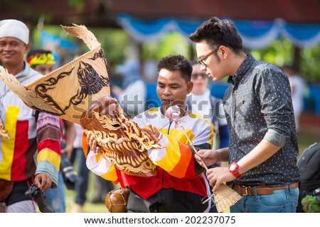 LOEI ,THAILAND-JUNE 27-29: Ghost Festival (Phi Ta Khon) is a type of masked procession celebrated on Buddhist merit- making holiday known in Thai as\
