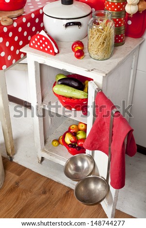 open cabinet with food in the bright kitchen
