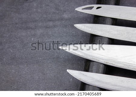 The Blades of knives concept. Sharp steel blades of knives on a dark background. Sharp knives collection. Stockfoto © 