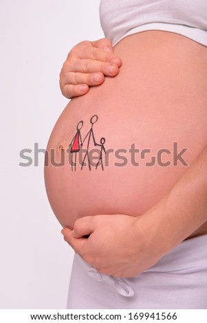 pregnant female with a hand drawn stick figure family on her baby belly