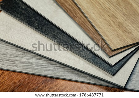 Laminate background. Samples of laminate or parquet with a pattern and wood texture for flooring and interior design. Production of wooden floors Stockfoto © 