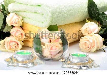 Towels and flowers for salon Spa, bath-houses and saunas