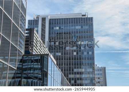 Modern building of mirrors\
Mirrors modern building with cloudy sky