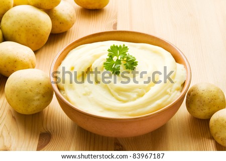 Bowl with mashed potatoes decorated with potatoes