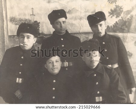USSR city Baltisk - CIRCA 1954s: Vintage photo shows five soldiers smoking,  1954s