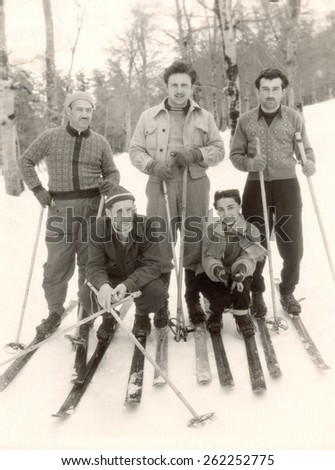 Ussr - CIRCA 1956s: An antique Black & White photo of skiers standing on ski.