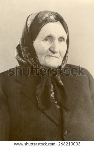 USSR, Russia, - CIRCA 1970s: An antique Black & White photo of a portrait of elderly serious woman, age between 70 and 90