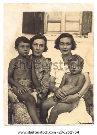 USSR - CIRCA 1948s: An antique Black & White photo of two sisters with their children