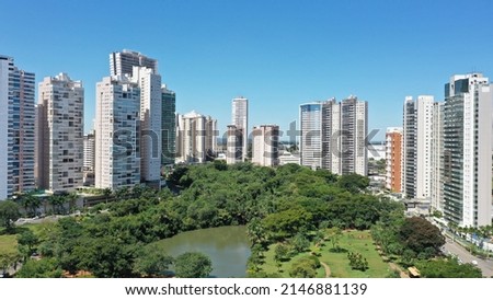 Panoramic view of Flamboyant Park with a beautiful park with tropical trees, lakes and modern buildings. Goiania, Goias, Brazil  Foto stock © 