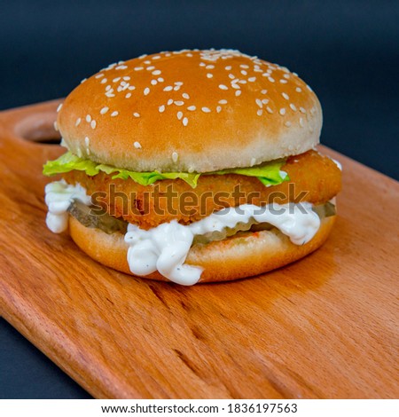 Tasty Fillet-O-Fish Burger On A Wooden Deck Foto stock © 