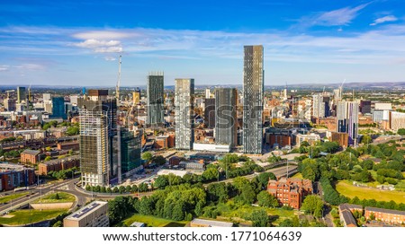 Aerial shot of Manchester UK on a beautiful summer day during pandemic lock-down 