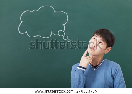 The guy pensive mood, speculates cloud drawn on the chalkboard