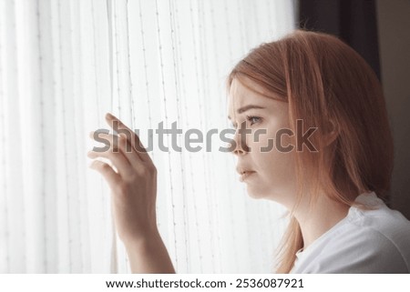 Similar – Image, Stock Photo Downcast Woman with Hair Covering Face