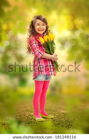 Smiling girl with big bouquet of flowers. Spring, Mothers day, family holiday, Happiness concept.