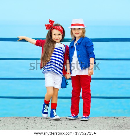 Similar – Image, Stock Photo Two little girls are fishing in ocean surf at sunset. Summer leisure, hobby and fun for kids.