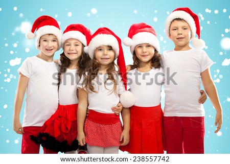 Group of happy kids in Christmas hat. Holidays, christmas, new year, x-mas concept.