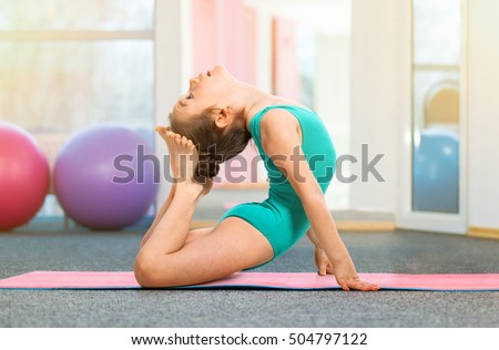 Similar – Image, Stock Photo Flexible acrobatic girl sitting on bed