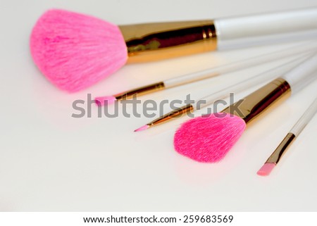 Professional accessories for makeup face on a white background