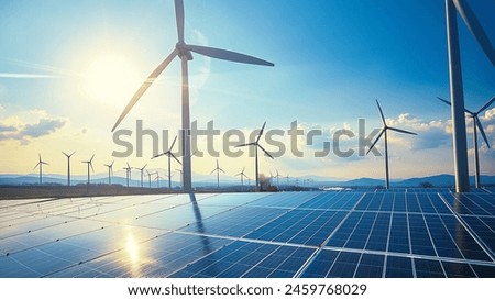 Similar – Image, Stock Photo A wind energy electric windmill turbine in a colorful sunset and landscape