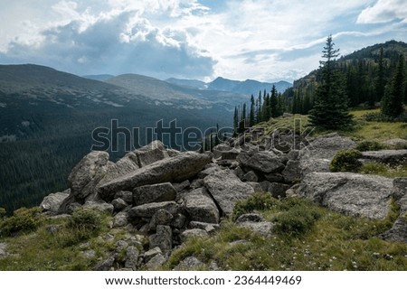 Similar – Foto Bild Grüner Wald in felsigen Bergen hoch in Wolken