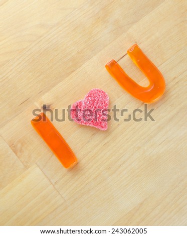 A playful message in gummy candy to express love