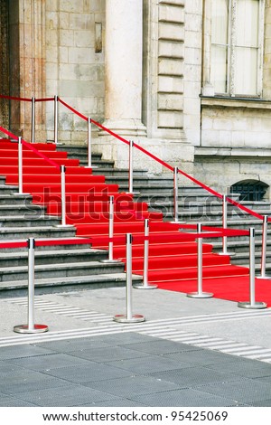 Beautiful shot of red carpet stairs awaiting vip, celebrities or government officials for a celebration or special  event.