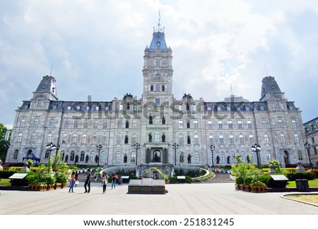 QUEBEC CITY, CANADA - JULY, 20: Tourists in front of the province of Quebec\'s parliament on July 20, 2014. The 1886 building is located just outside Old Quebec\'s walls.
