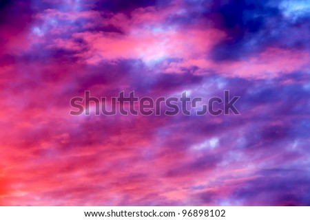 Great sunset sky with clouds all possible shades of pink and purple, great nature background.