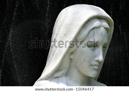 Hooded White Female Head Sculpture Facing Right