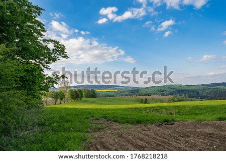 Similar – Image, Stock Photo Further view over trees of the Yosemite-Vally to the “El Capitan” and waterfalls.