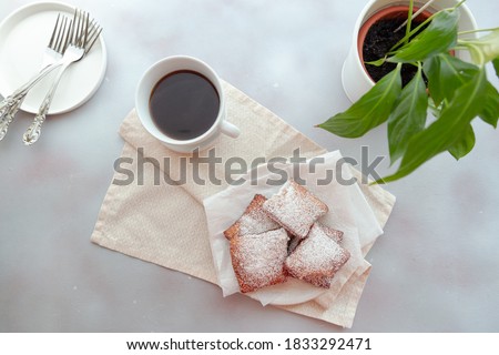 breakfast with black coffee and beignets Stockfoto © 