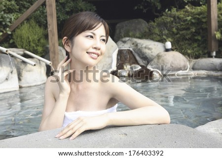 Japanese woman entering the hot spring