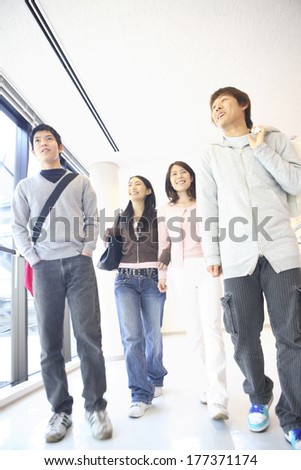 College students walking down the hall